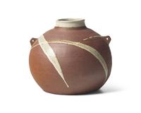 Bulbous vase with lugs