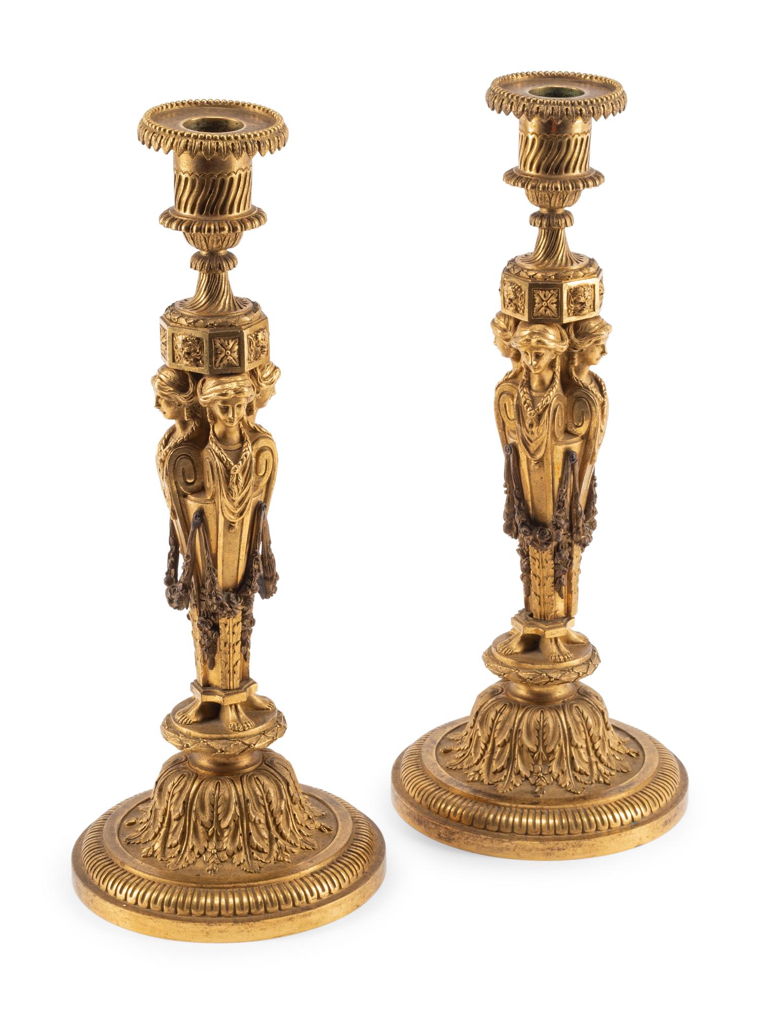 A Pair of Louis XVI Style Gilt Bronze Candlesticks