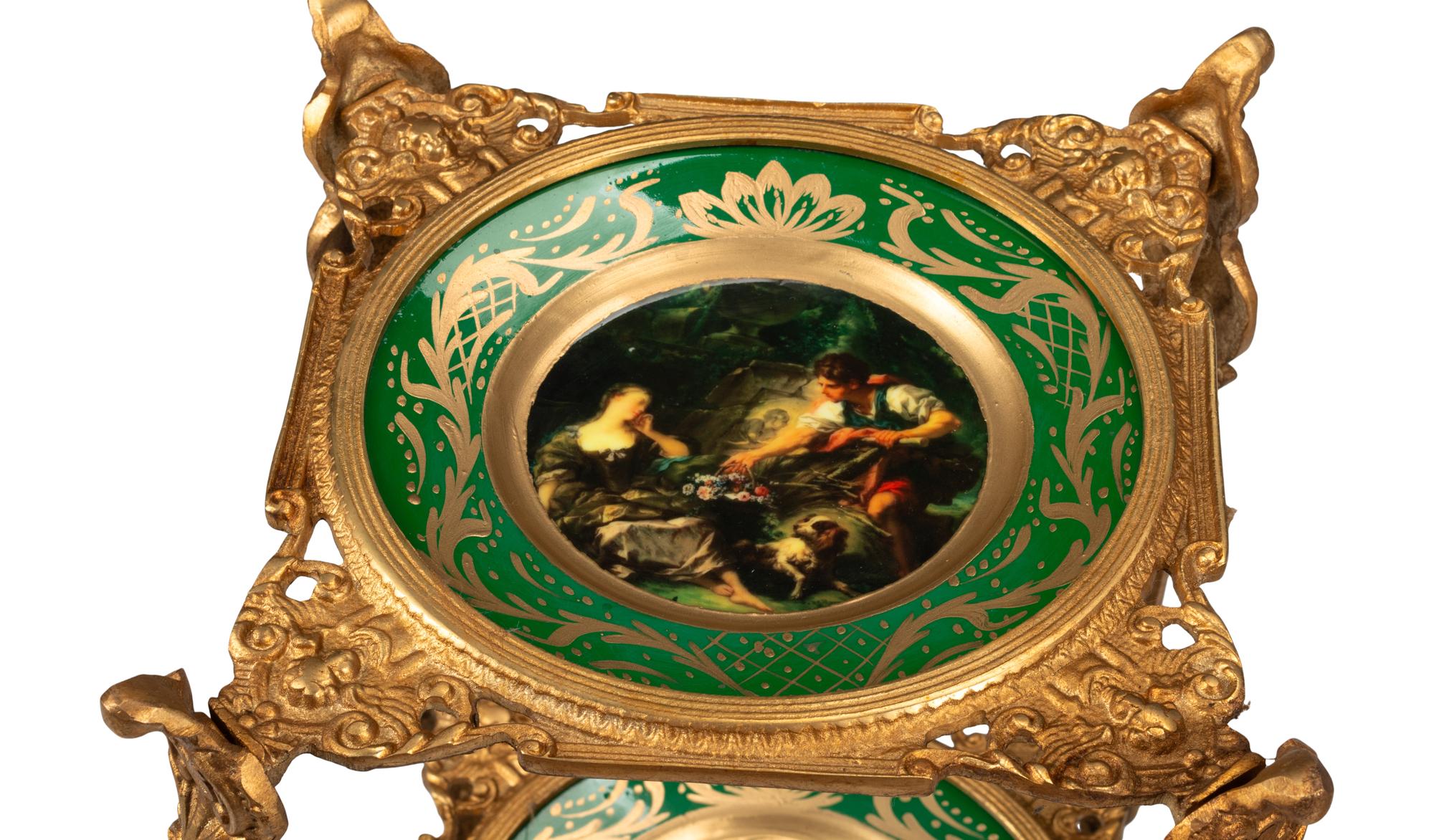 A Pair of Gilt Bronze and Porcelain Dessert Stands