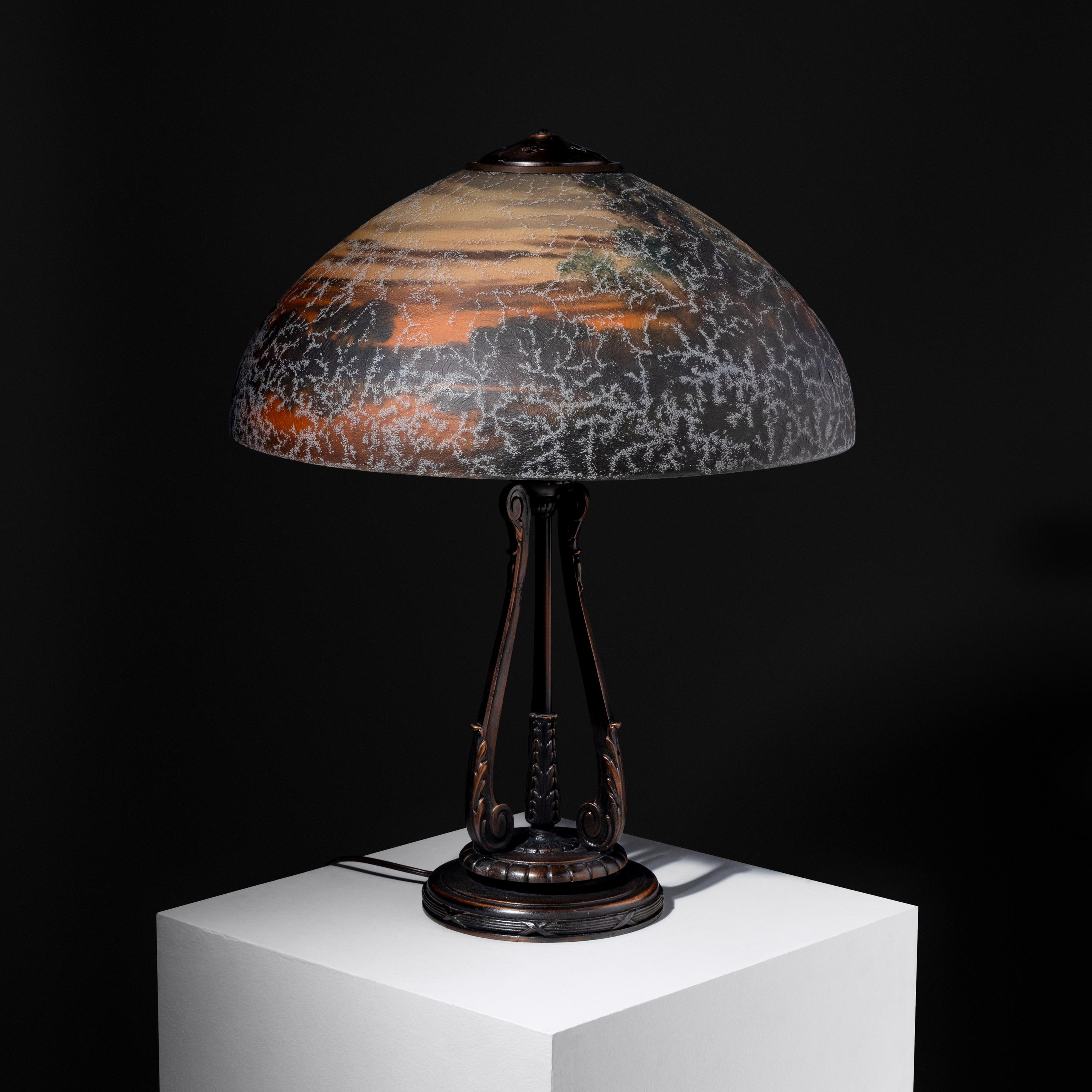 Reverse-painted glass table lamp, wooded landscape