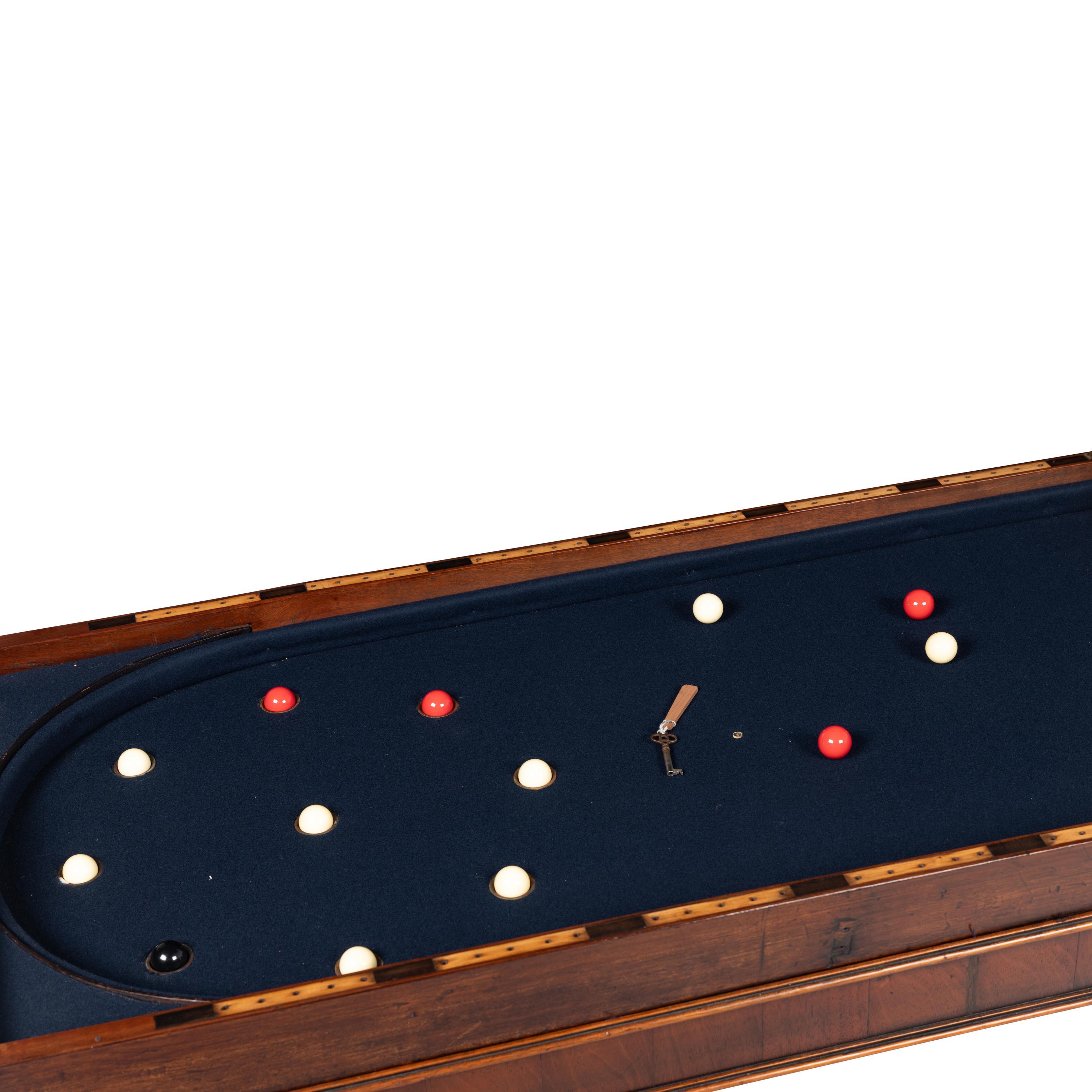 An English Mahogany and Gilt Bronze Mounted Bagatelle Table