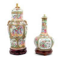 Two Chinese Export Rose Medallion Porcelain Covered Vases Height of taller 19 1/2 inches. — 19TH CENTURY