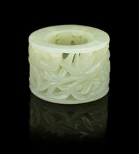 A Carved Jade Archer's Ring Diameter 1 3/8 inches.