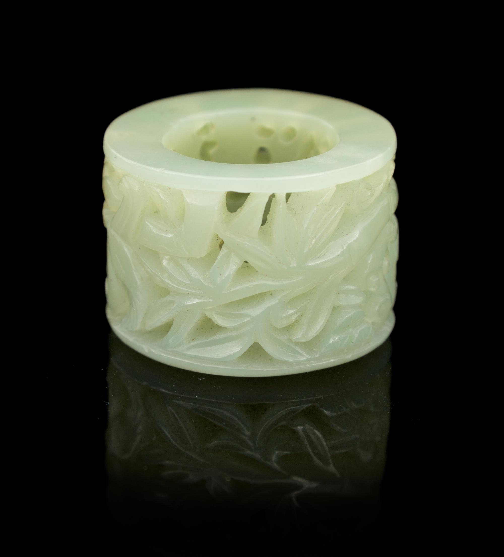 A Carved Jade Archer's Ring Diameter 1 3/8 inches.