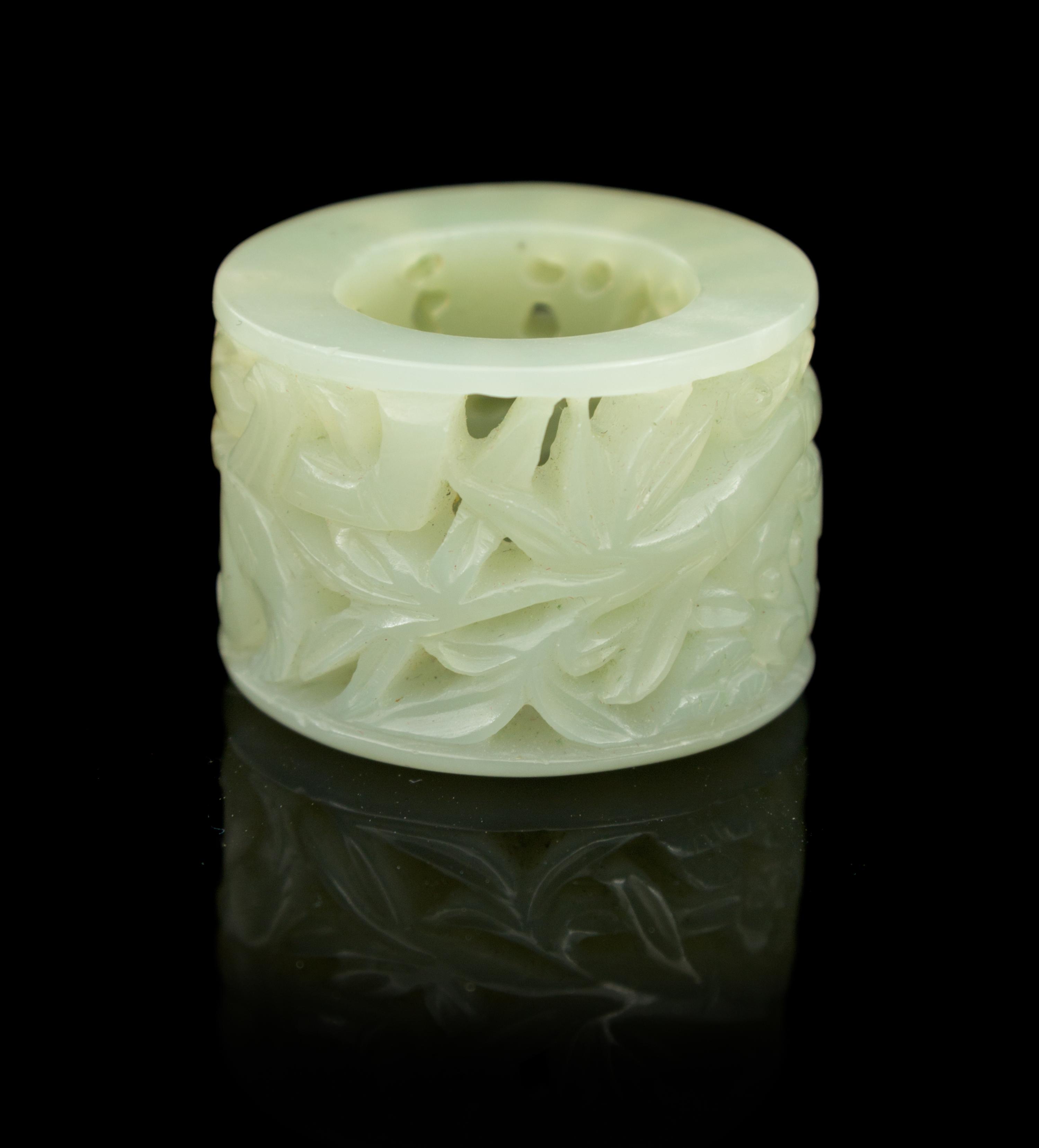 A Carved Jade Archer's Ring Diameter 1 3/8 inches.