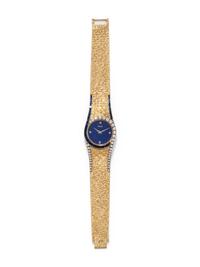 PIAGET, 18K YELLOW GOLD, LAPIS LAZULI, DIAMOND AND SAPPHIRE WRISTWATCH