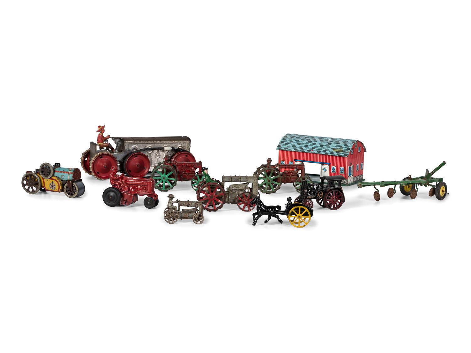 Eleven Metal Tractors and Other Farm Toys