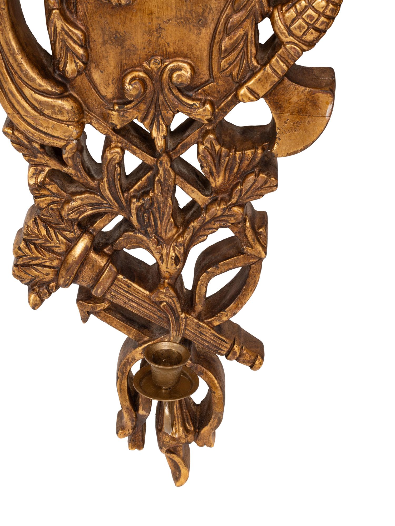 A Set of Four Louis XV Style Giltwood Single-Light Sconces