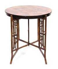 A Victorian Bamboo X-form Base Circular Table with Inlaid Top Height 24 1/2 x diameter 25 inches.