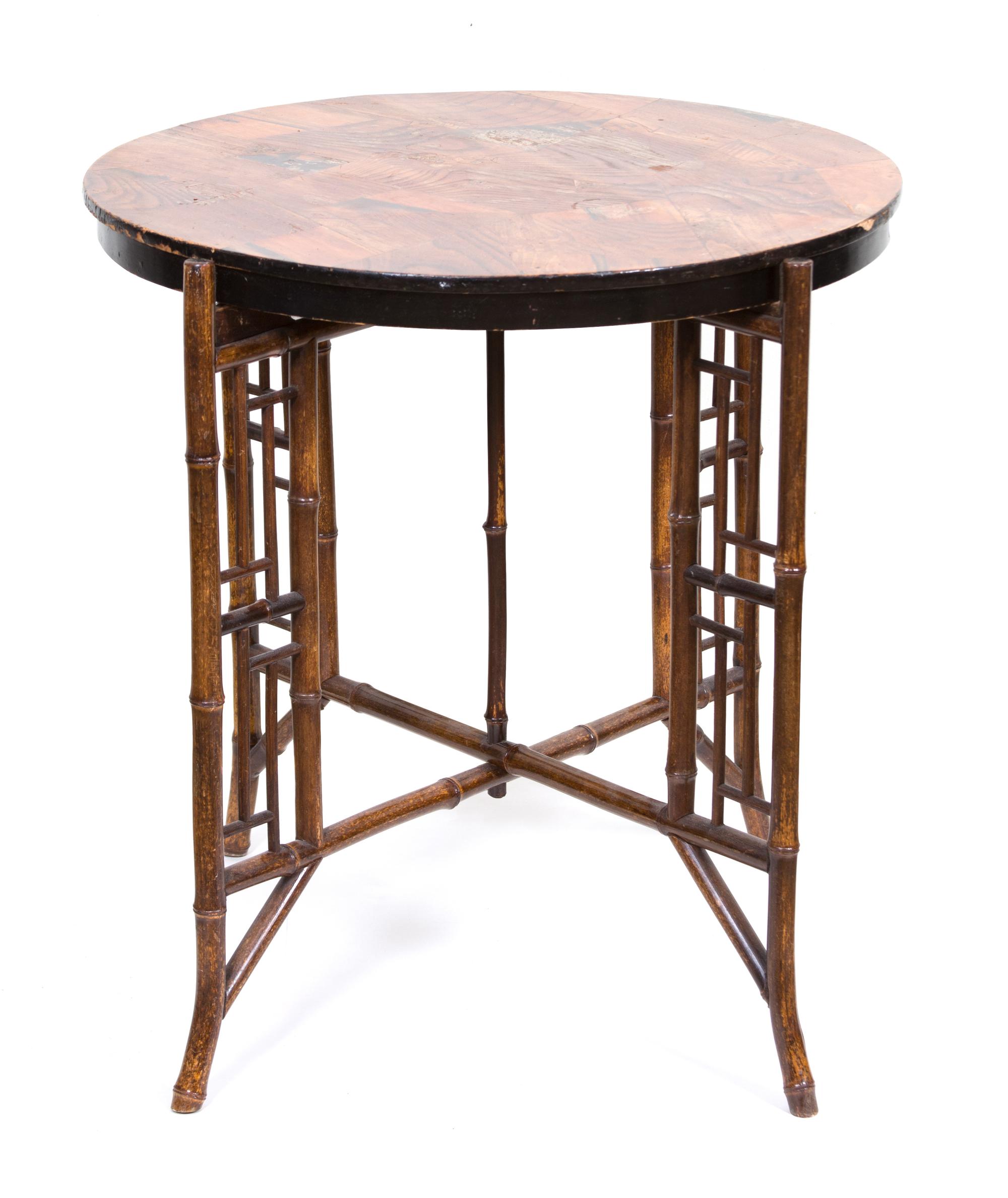 A Victorian Bamboo X-form Base Circular Table with Inlaid Top Height 24 1/2 x diameter 25 inches.