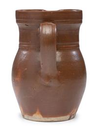 A P.H. Smith Albany Slip Stoneware Pitcher