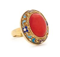 A Coral Ring Height of stone 8 /8 inches, interior diameter 3/4 inches.