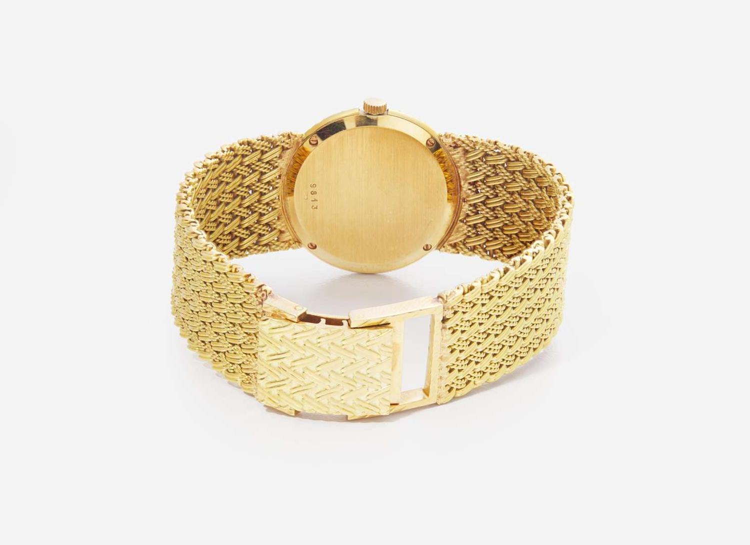 A Ladies 18K Yellow Gold Bueche Girod Watch