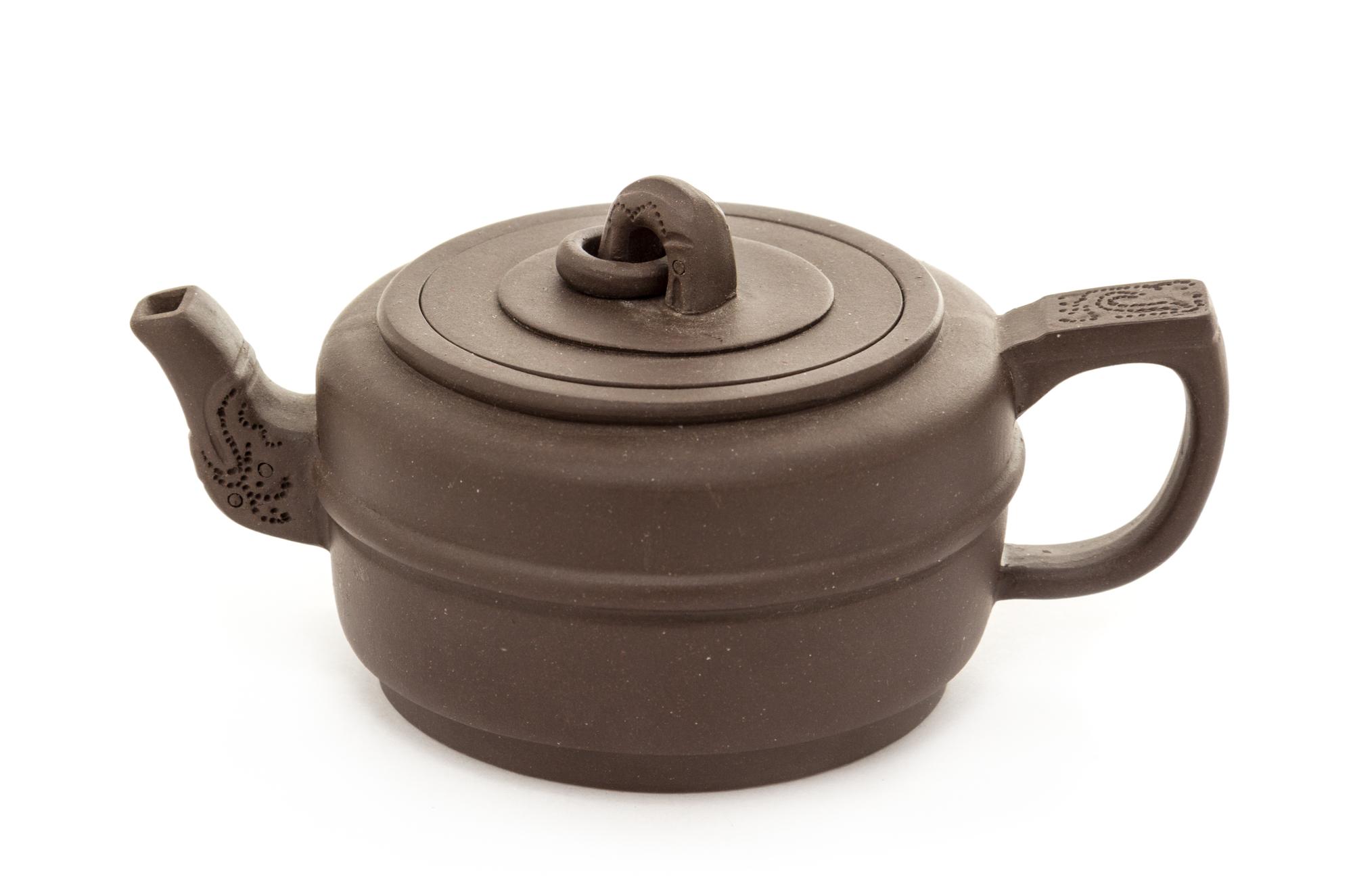A Yixing Pottery Teapot Height 2 3/8 inches.
