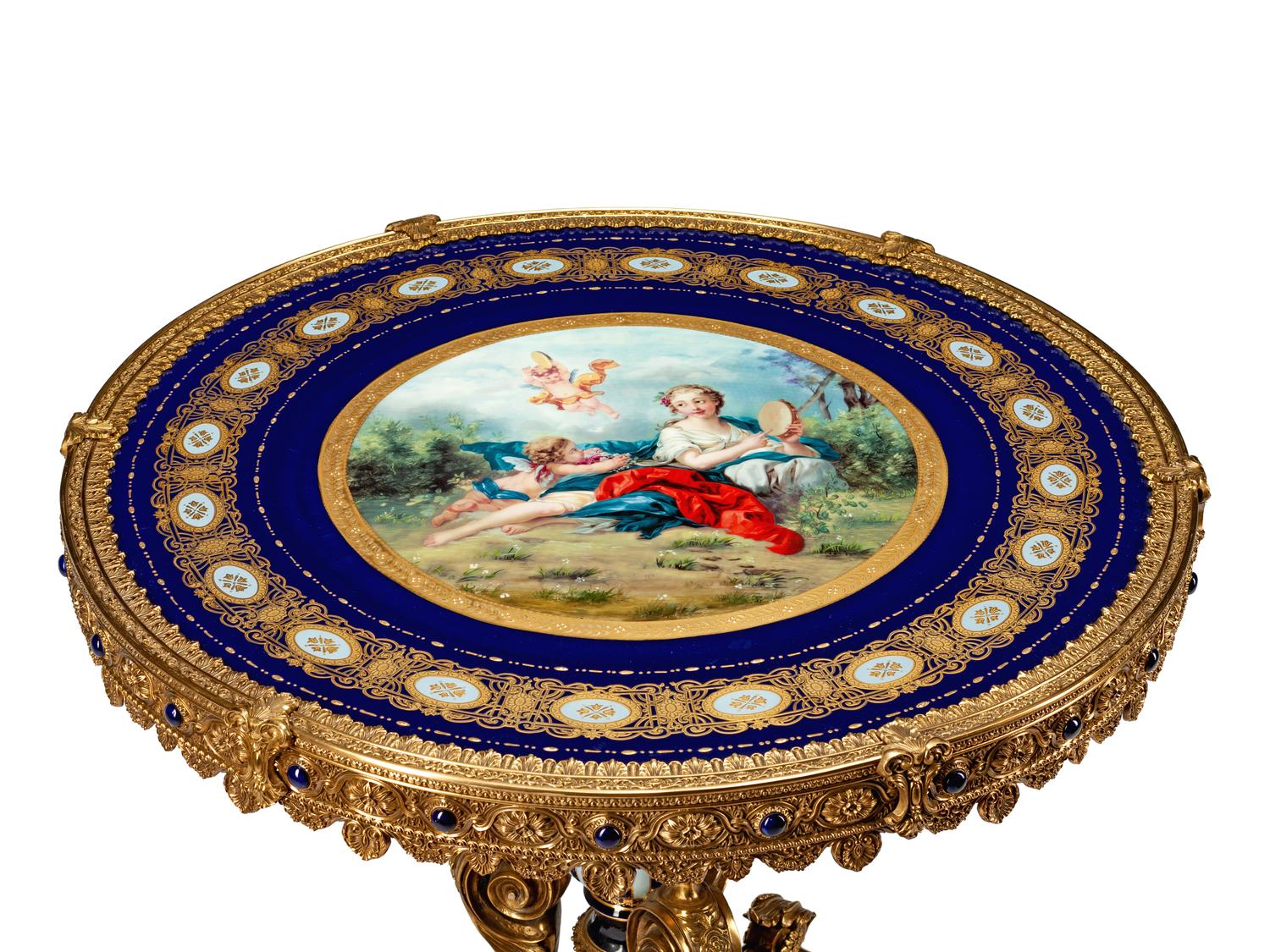 A Louis XVI Style Gilt-Bronze-Mounted Sevres Style Porcelain Gueridon