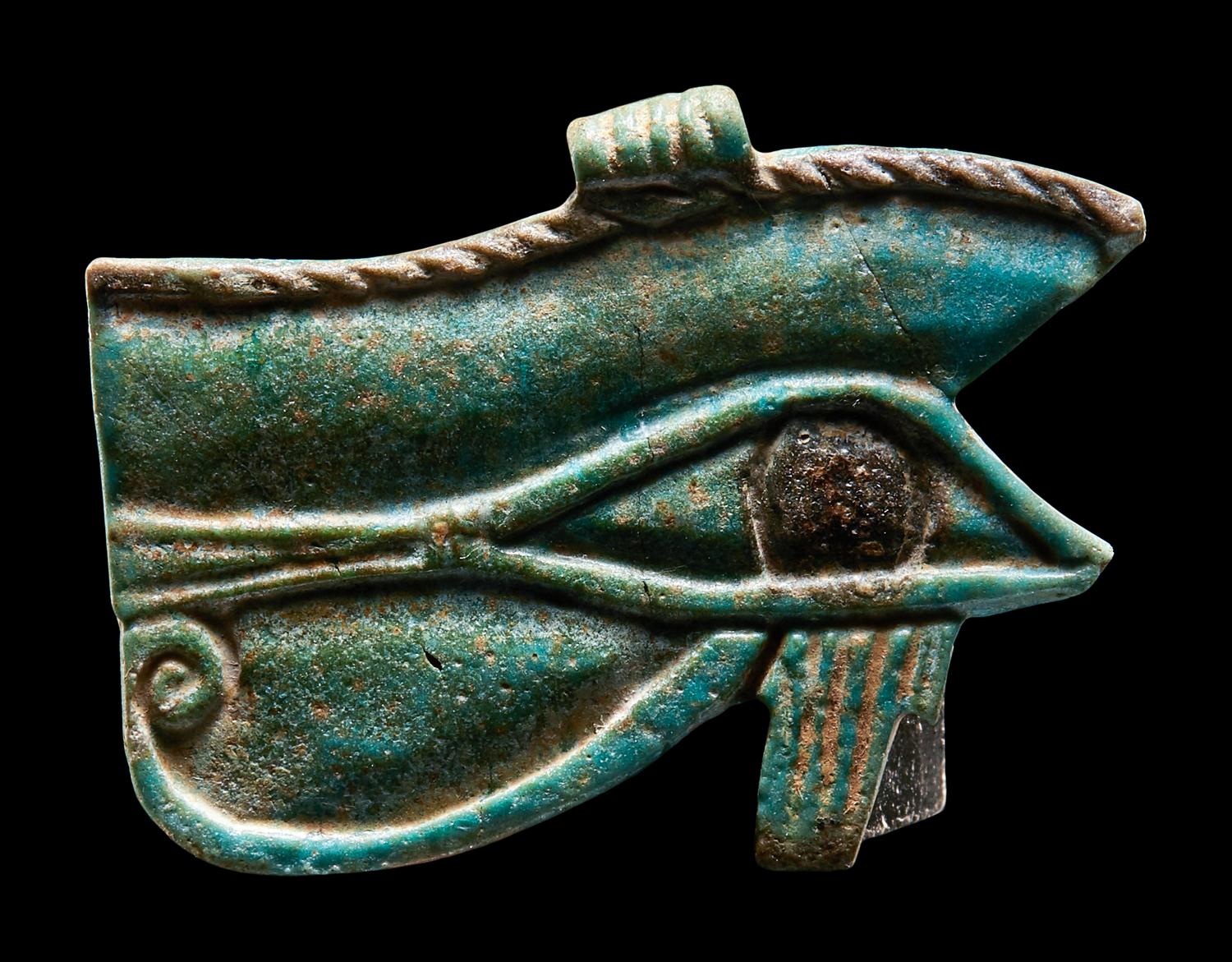 An Egyptian Faience Wadjet Eye Amulet