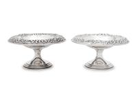 A Pair of S. Kirk and Son Silver Repoussé Compotes