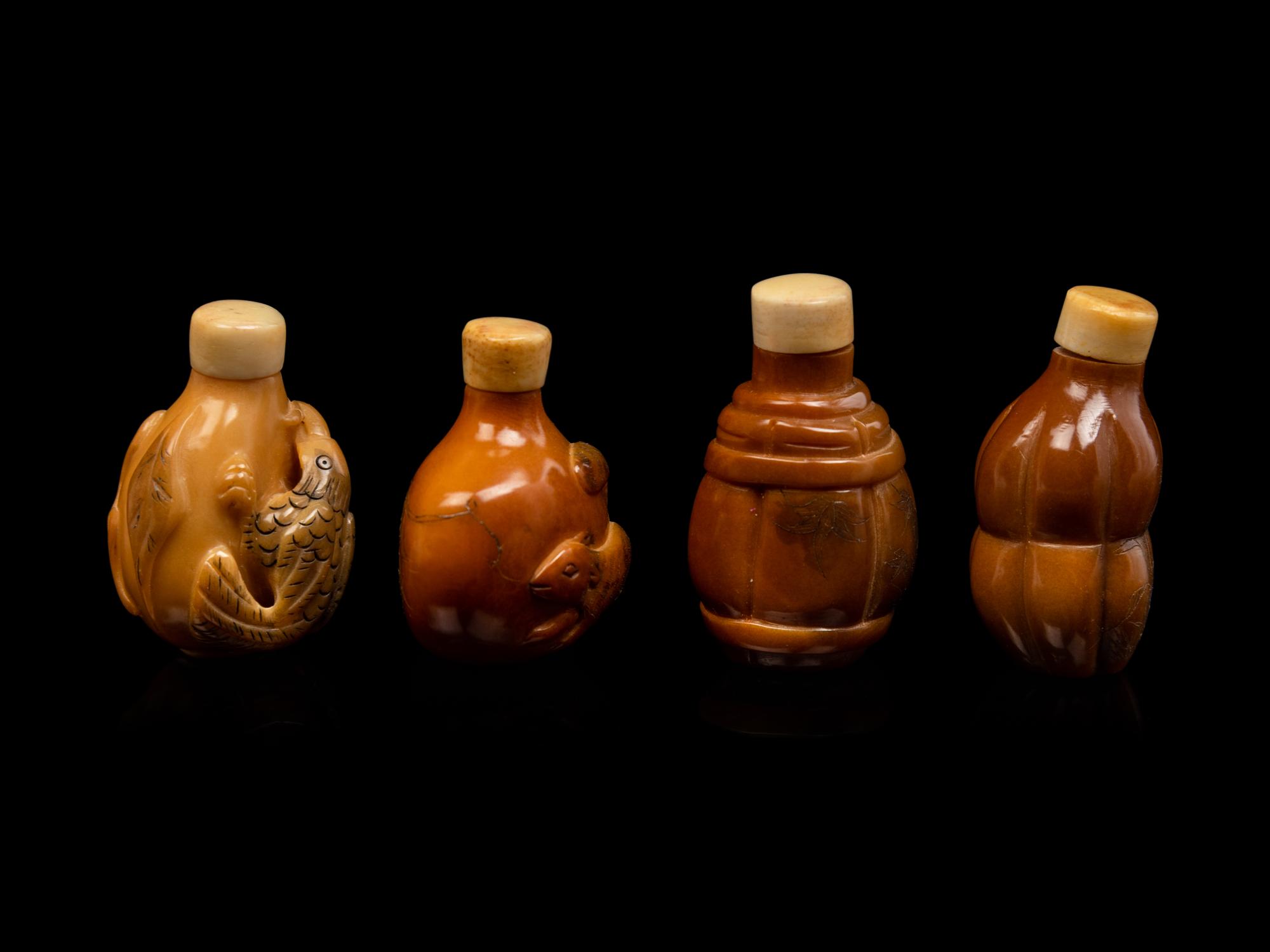 Four Chinese Carved Horn Snuff Bottles