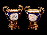 A Pair of Sevres Style Gilt-Bronze-Mounted Porcelain Cache Pots