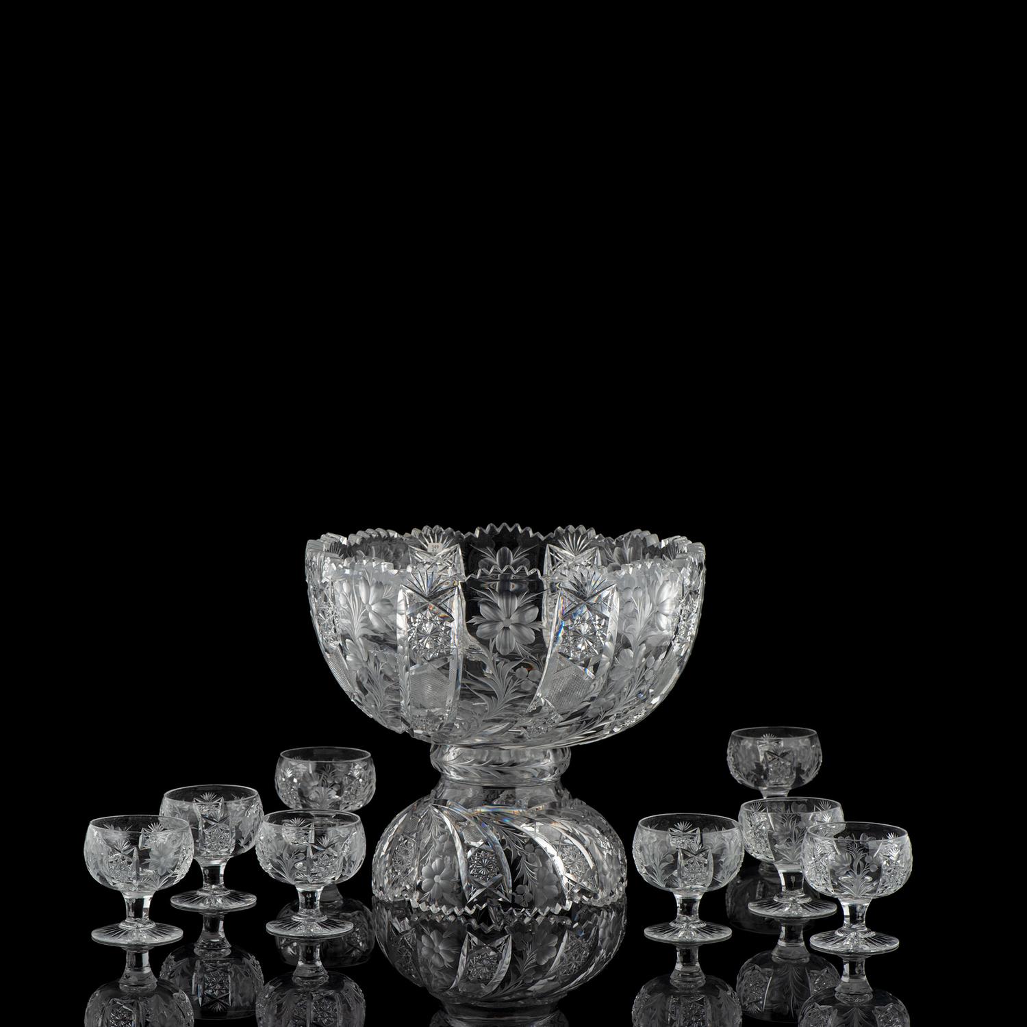 A Tuthill Intaglio-Cut Glass Punch Bowl with Eight Cups