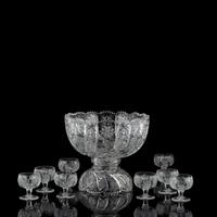 A Tuthill Intaglio-Cut Glass Punch Bowl with Eight Cups