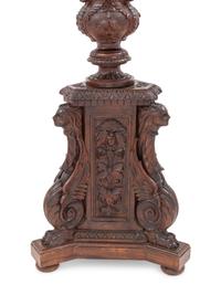 An Italian Carved Walnut Tripartite Pedestal
