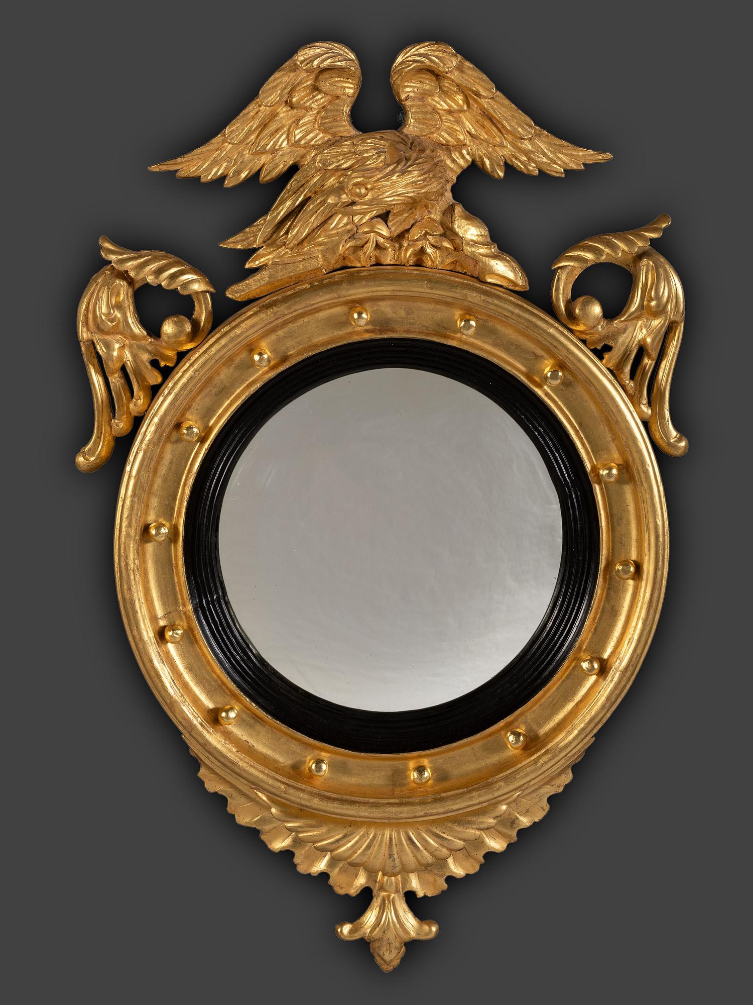 A Pair of Federal Giltwood Bull's Eye Looking Glasses