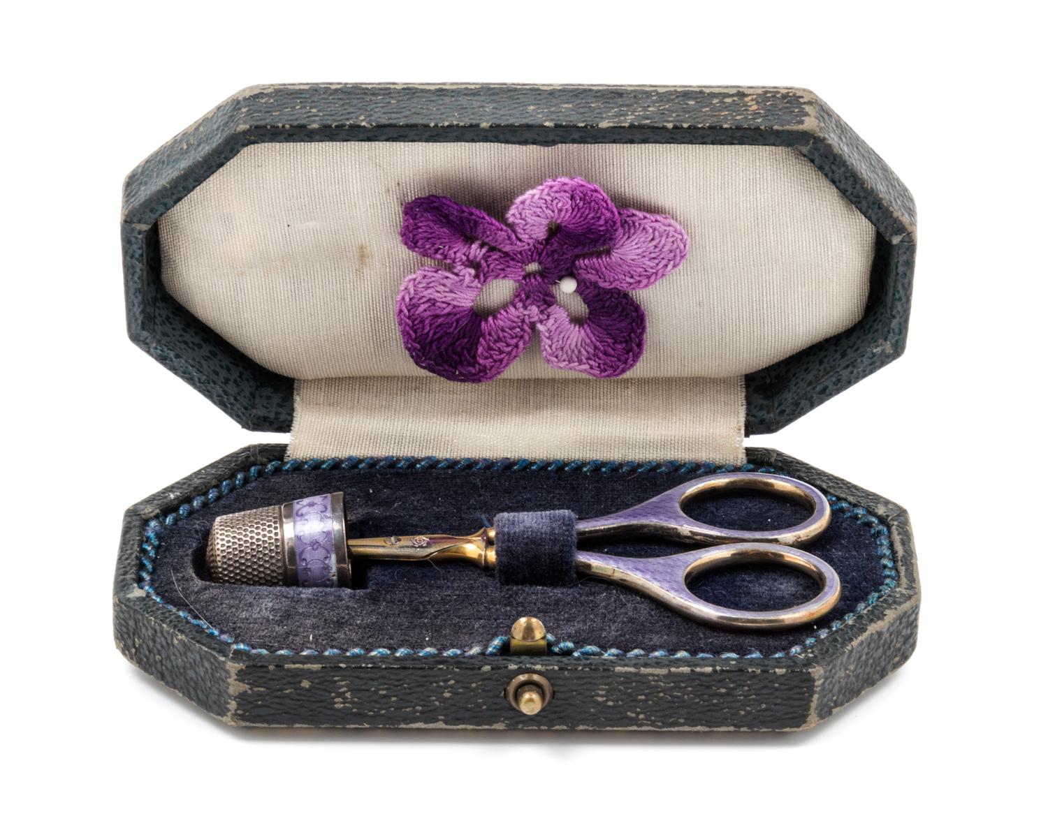 A German Silver and Guilloche Enamel Thimble and Scissor Kit, , the thimble having a guilloche enamel band with floral and C-scroll dec