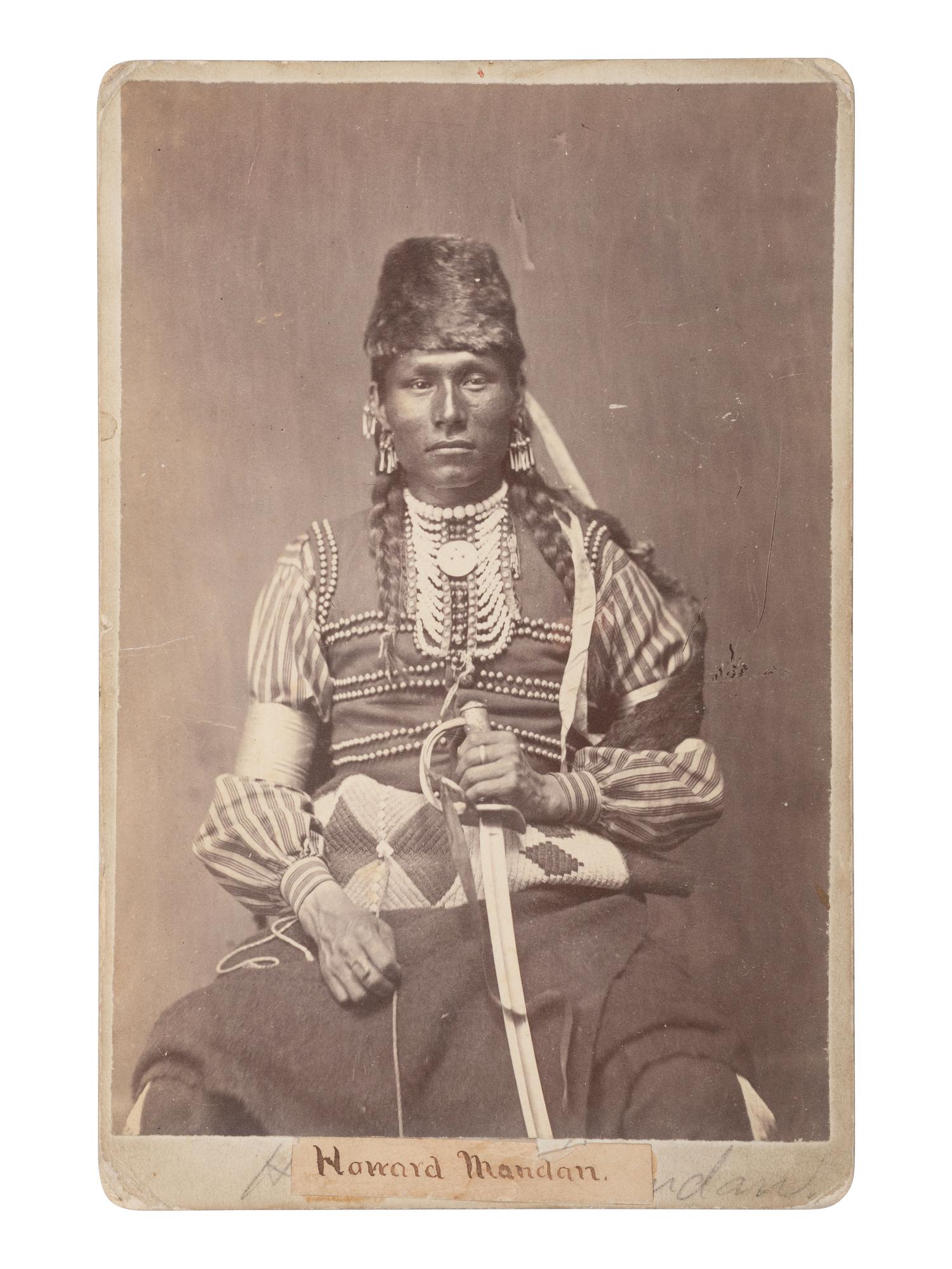 [CUSTER, George Armstrong]. Cabinet card of Osage scout identified as "Howard Mandan" who served with Custer at the Battle of Washita. Fort A. Lincoln, DT: M.A. Breese & Co.