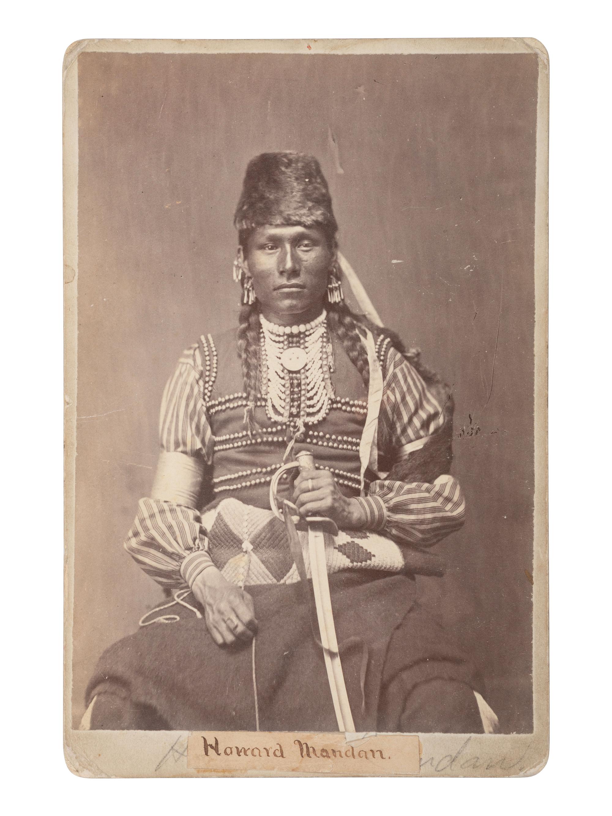 [CUSTER, George Armstrong]. Cabinet card of Osage scout identified as "Howard Mandan" who served with Custer at the Battle of Washita. Fort A. Lincoln, DT: M.A. Breese & Co.