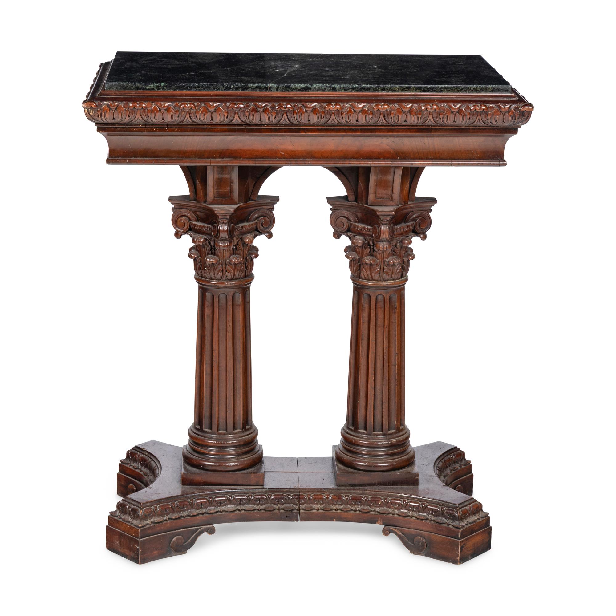 A Renaissance Style Walnut and Marble Pedestal Table