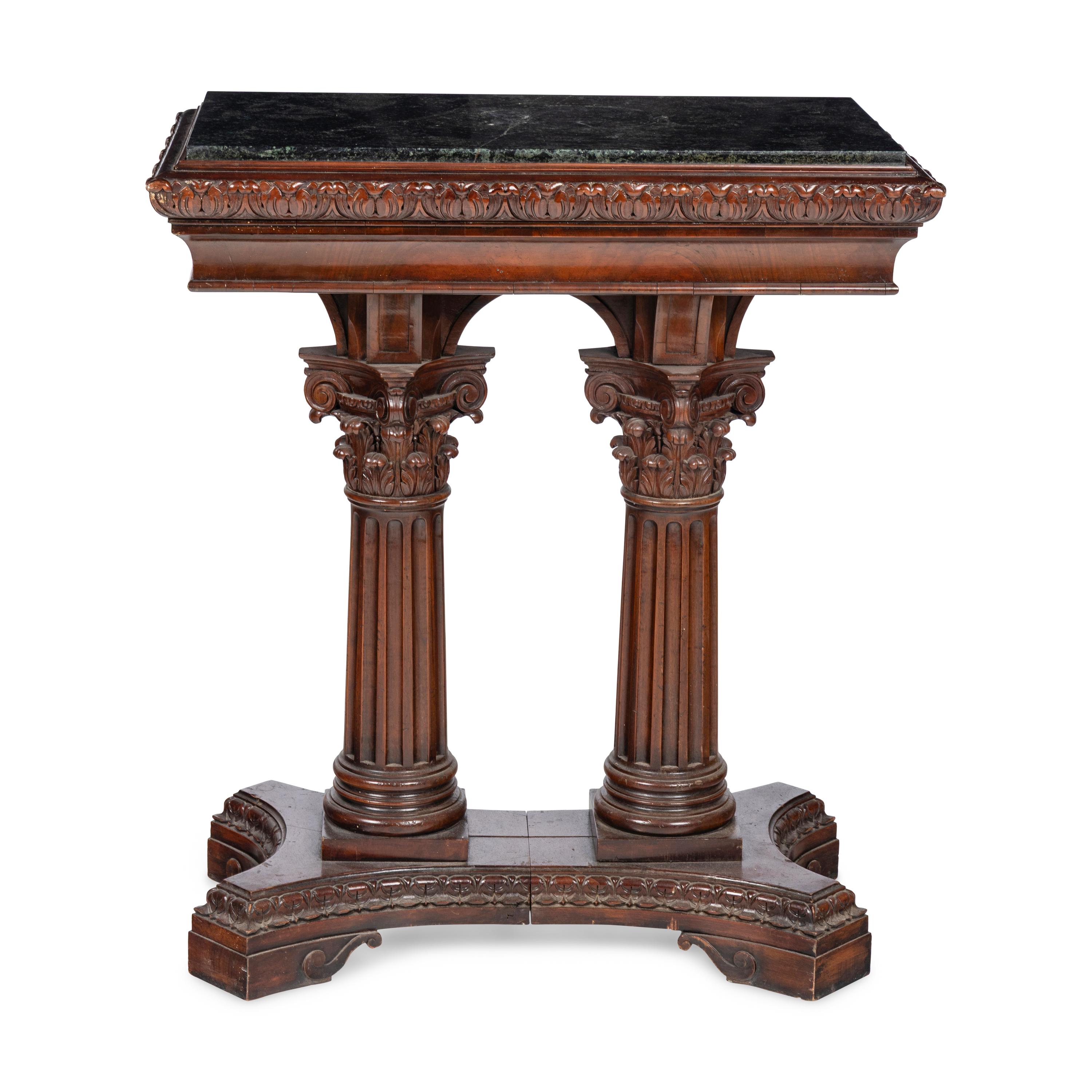 A Renaissance Style Walnut and Marble Pedestal Table
