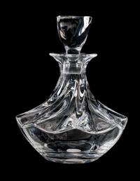 A Lalique Molded Glass Decanter Height 9 inches. — 20TH CENTURY