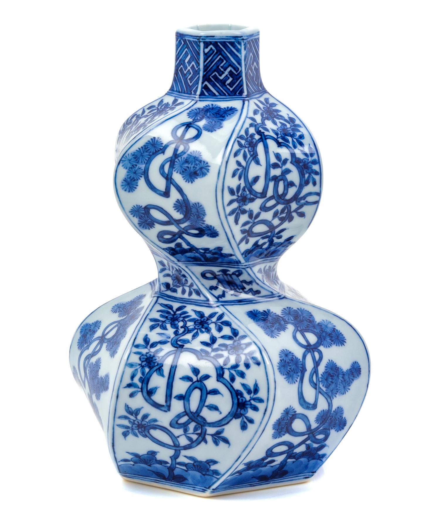 A Japanese Blue and White Porcelain Gourd Form Vase