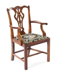 A Chippendale Style Mahogany Armchair, EARLY 20TH CENTURY, Height 38 1/2 inches. — EARLY 20TH CENTURY,