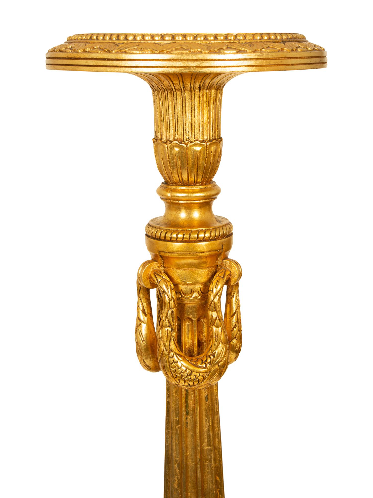 A Pair of Louis XVI Style Giltwood Torcheres — 20TH CENTURY