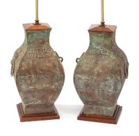 A Pair of Chinese Archaic Style Bronze Urns Height of bronze 18 inches.