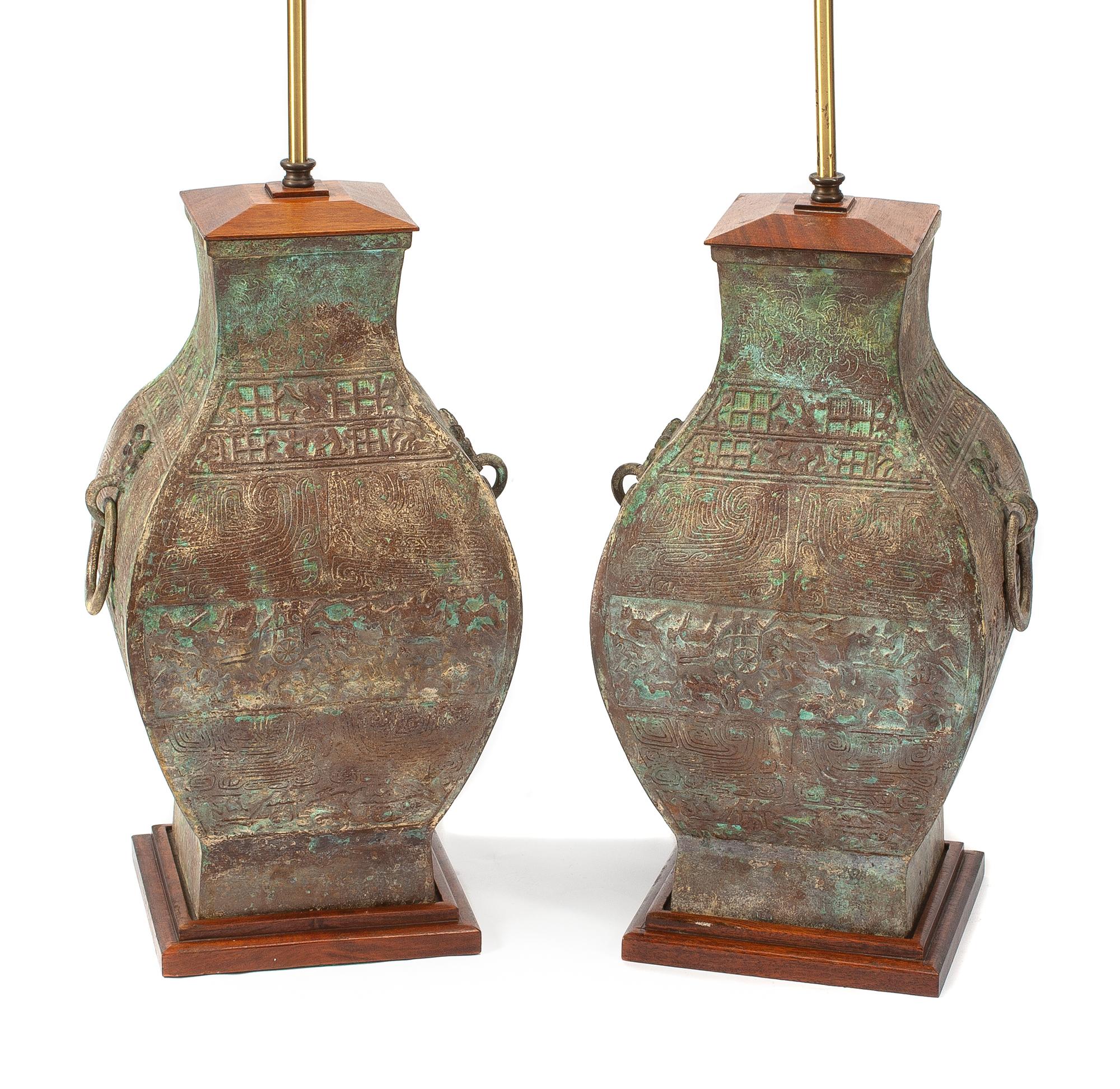 A Pair of Chinese Archaic Style Bronze Urns Height of bronze 18 inches.