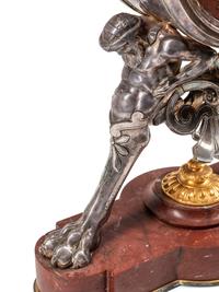 A French Neoclassical Gilt and Silvered Bronze and Marble Mantel Clock