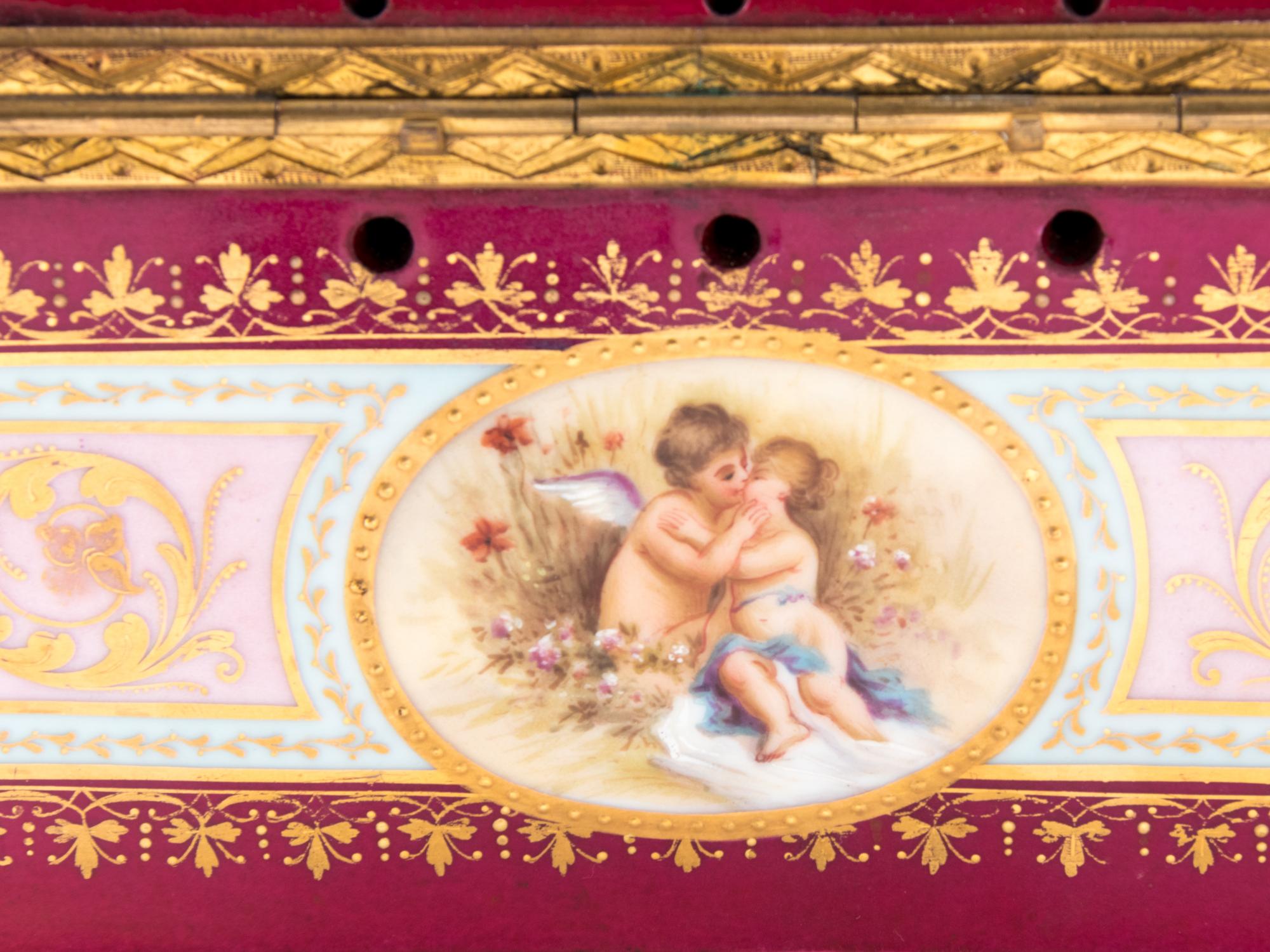 A Vienna Gilt Metal Mounted, Painted and Parcel Gilt Porcelain Table Casket
