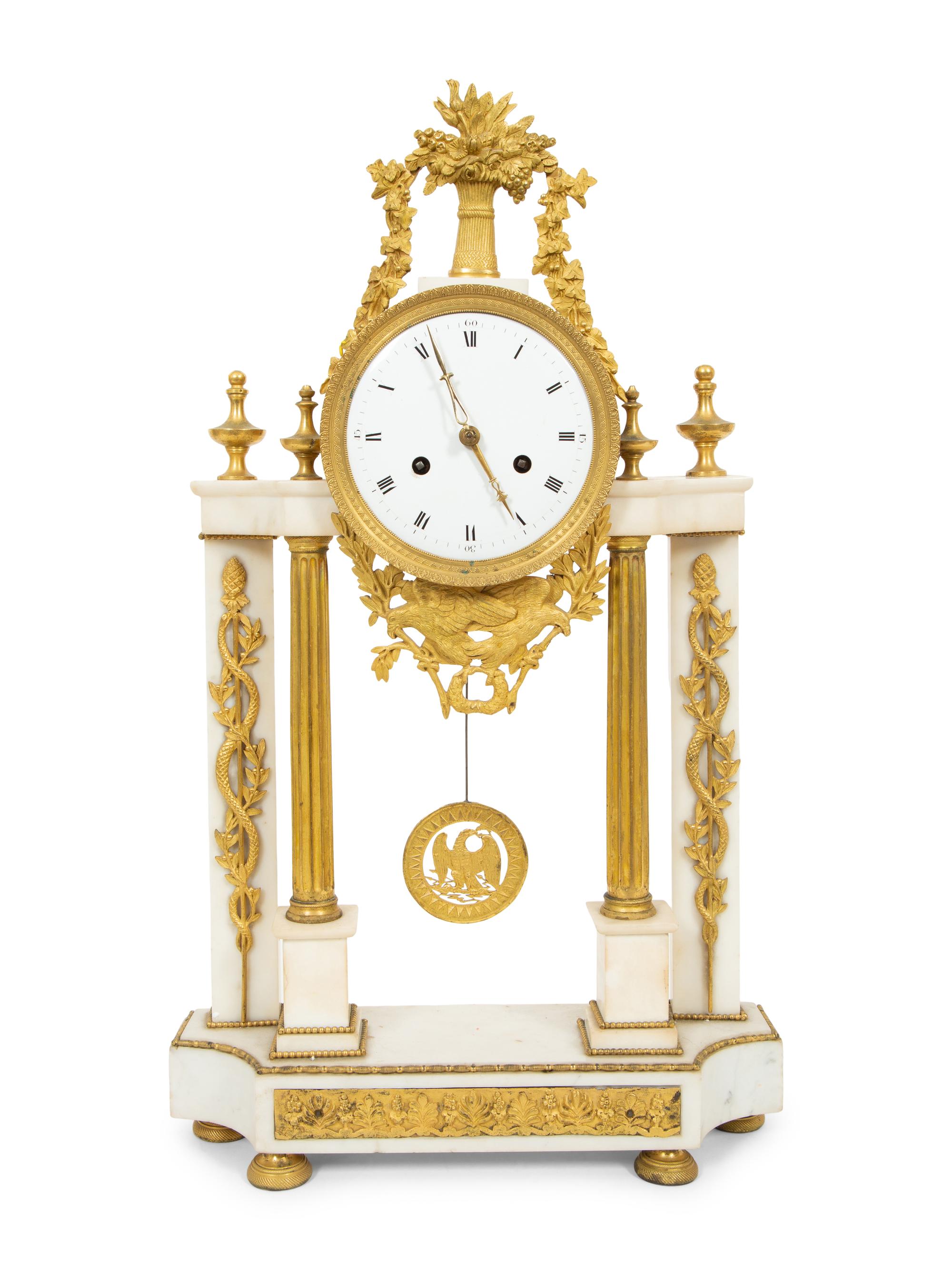 A French Gilt Bronze and White Marble Mantel Clock