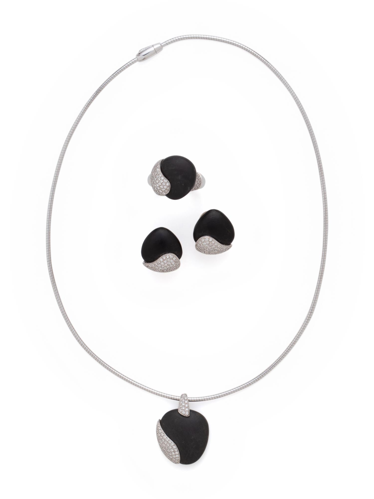 MOVADO, WHITE GOLD, PEBBLE AND DIAMOND SET
