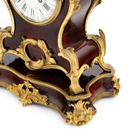 A French Gilt Bronze Mounted Faux Tortoise Shell Mantel Clock