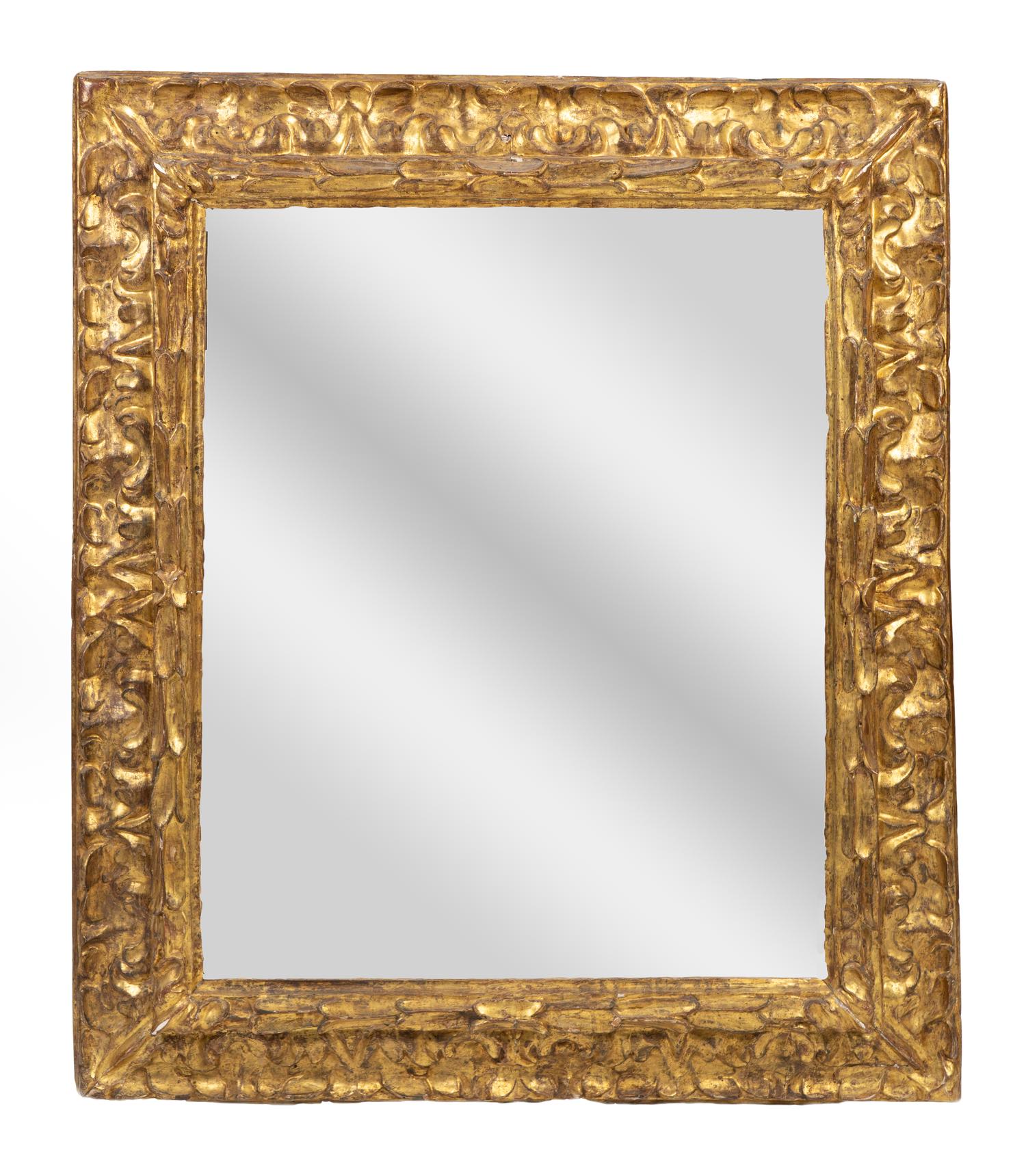 An Italian Baroque Giltwood Mirror