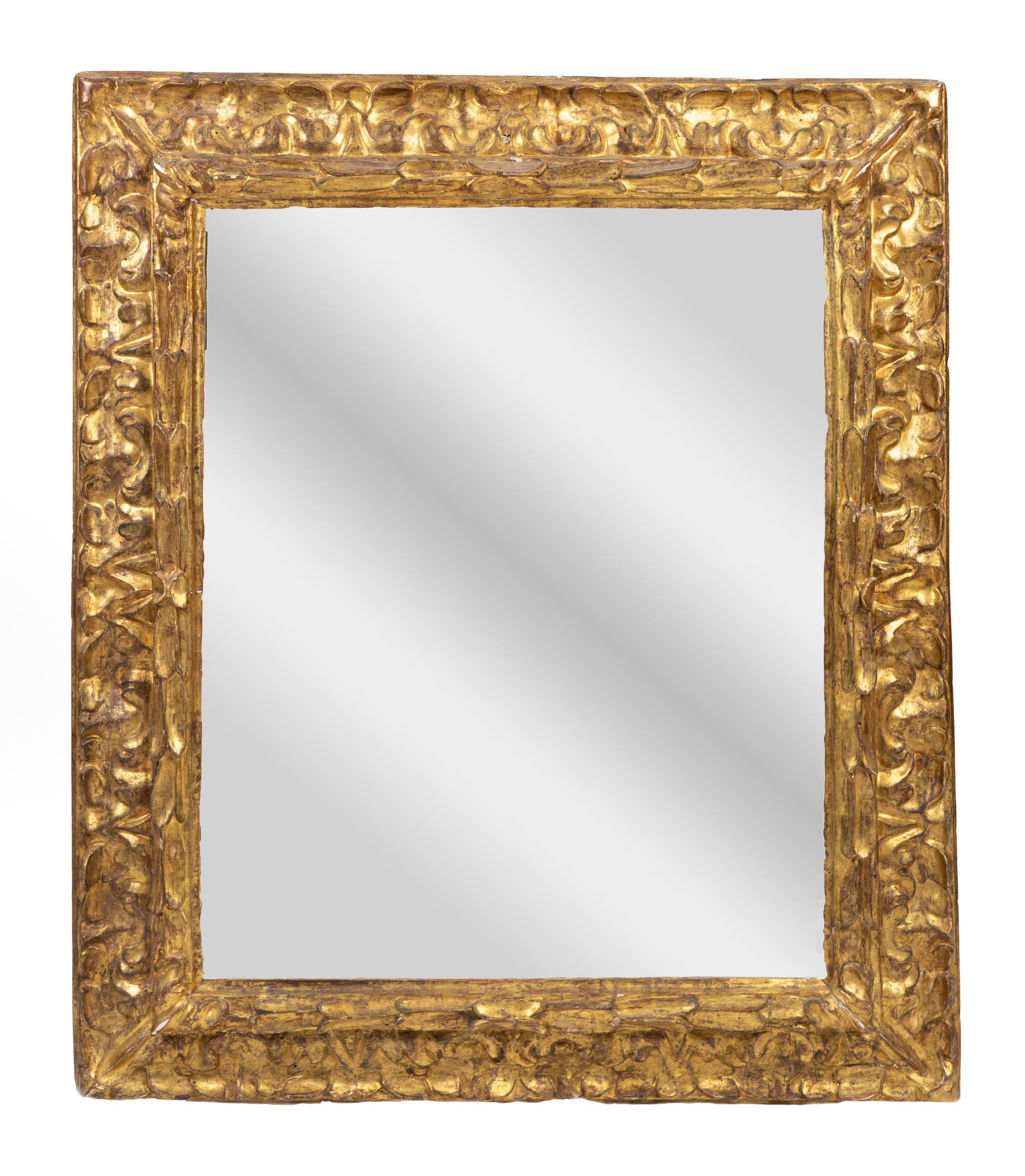 An Italian Baroque Giltwood Mirror