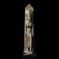 An Egyptian Bronze Lion-Headed Goddess and Obelisk