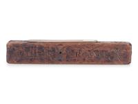 A Carved Wooden Folk Art Knife Sharpener