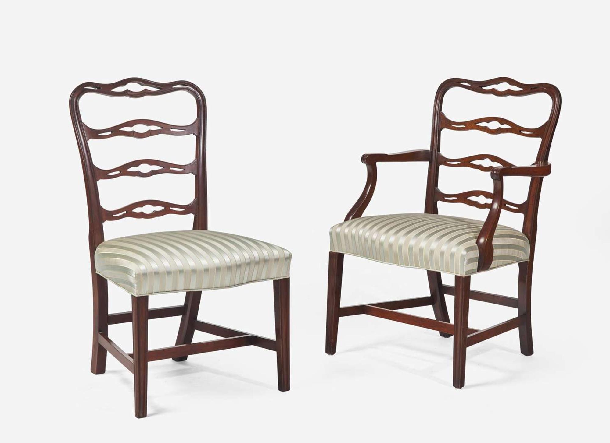 A set of eight Chippendale style mahogany ribbon-back dining chairs, 20th century
