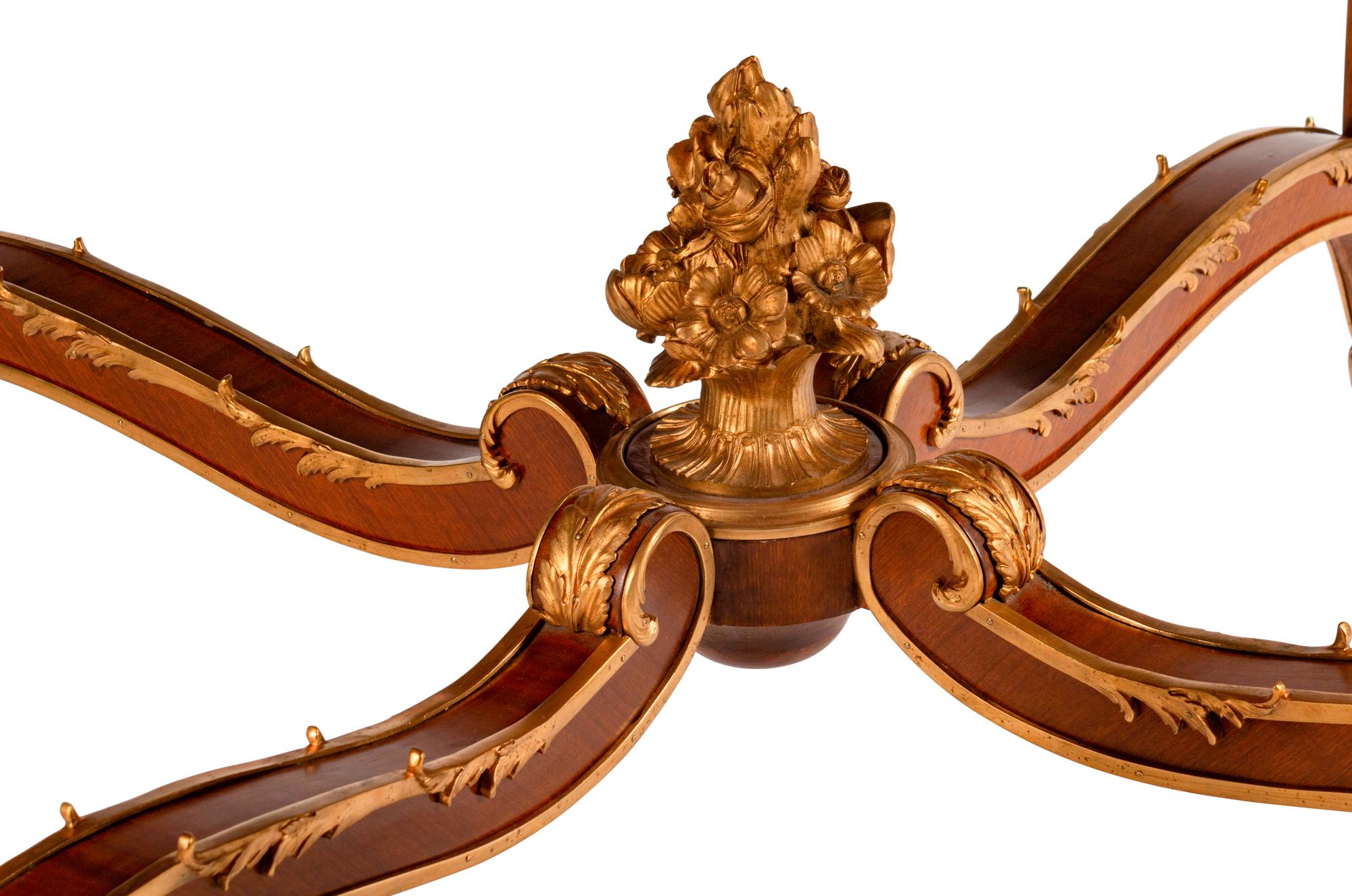 A Louis XV Style Gilt-Bronze-Mounted Kingwood Table de Milieu
