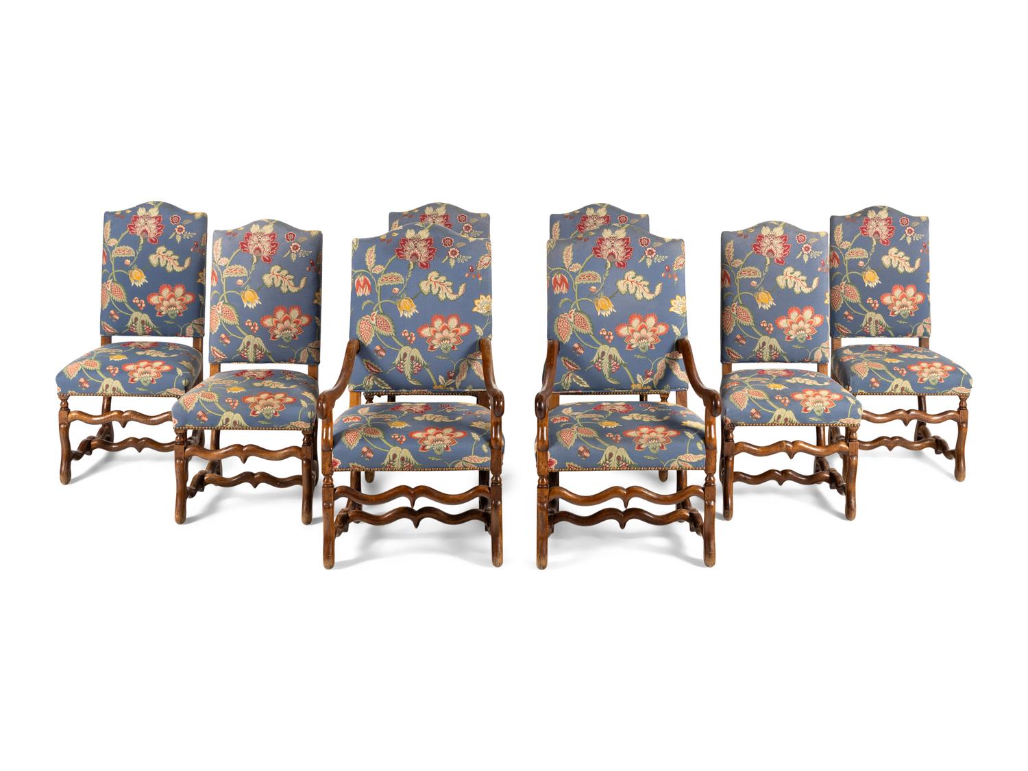 A Set of Eight Spanish Baroque Style Walnut Dining Chairs